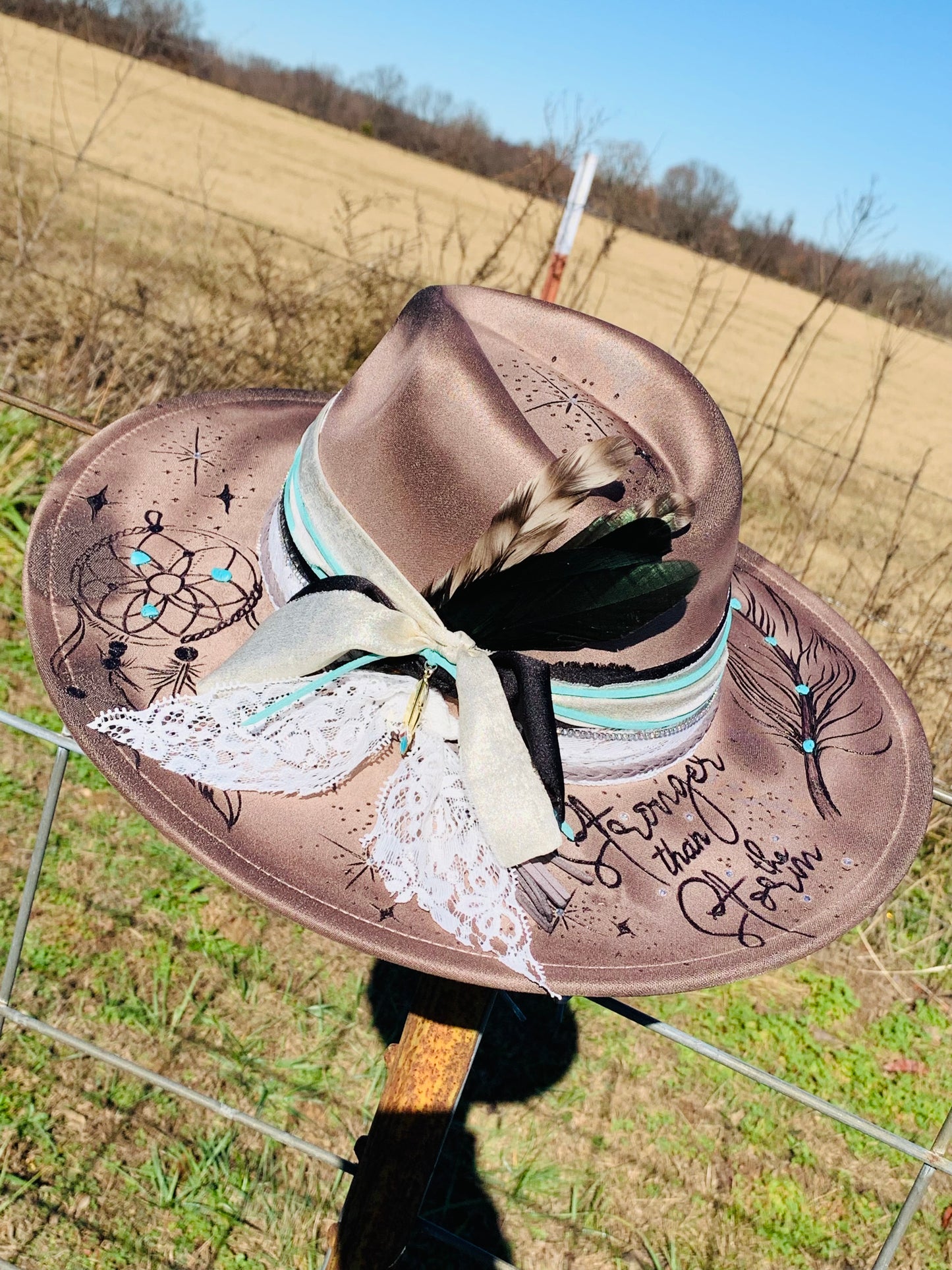 Hand Burned Rancher Hat with Feathers "Stronger than the Storm"