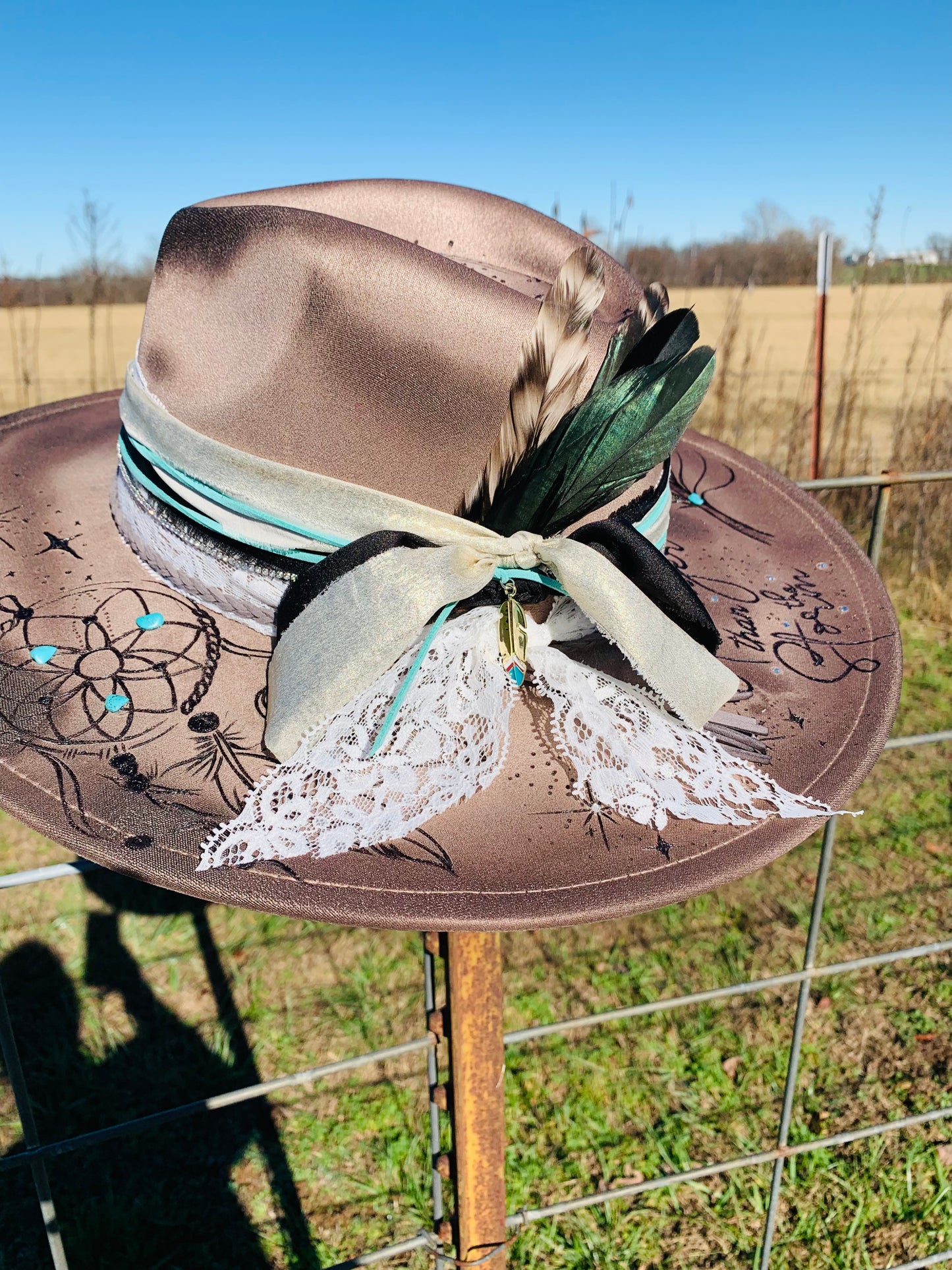 Hand Burned Rancher Hat with Feathers "Stronger than the Storm"