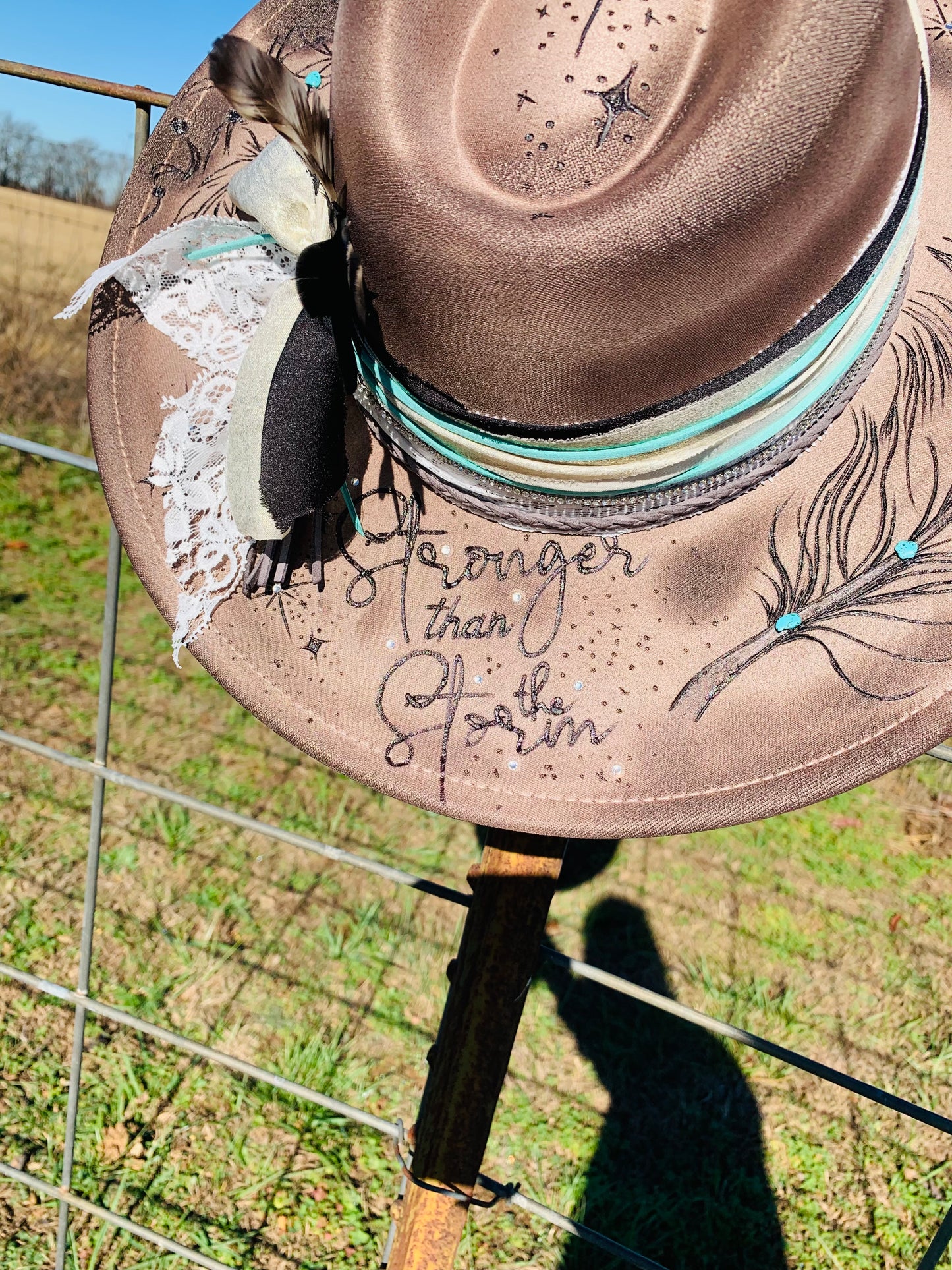 Hand Burned Rancher Hat with Feathers "Stronger than the Storm"