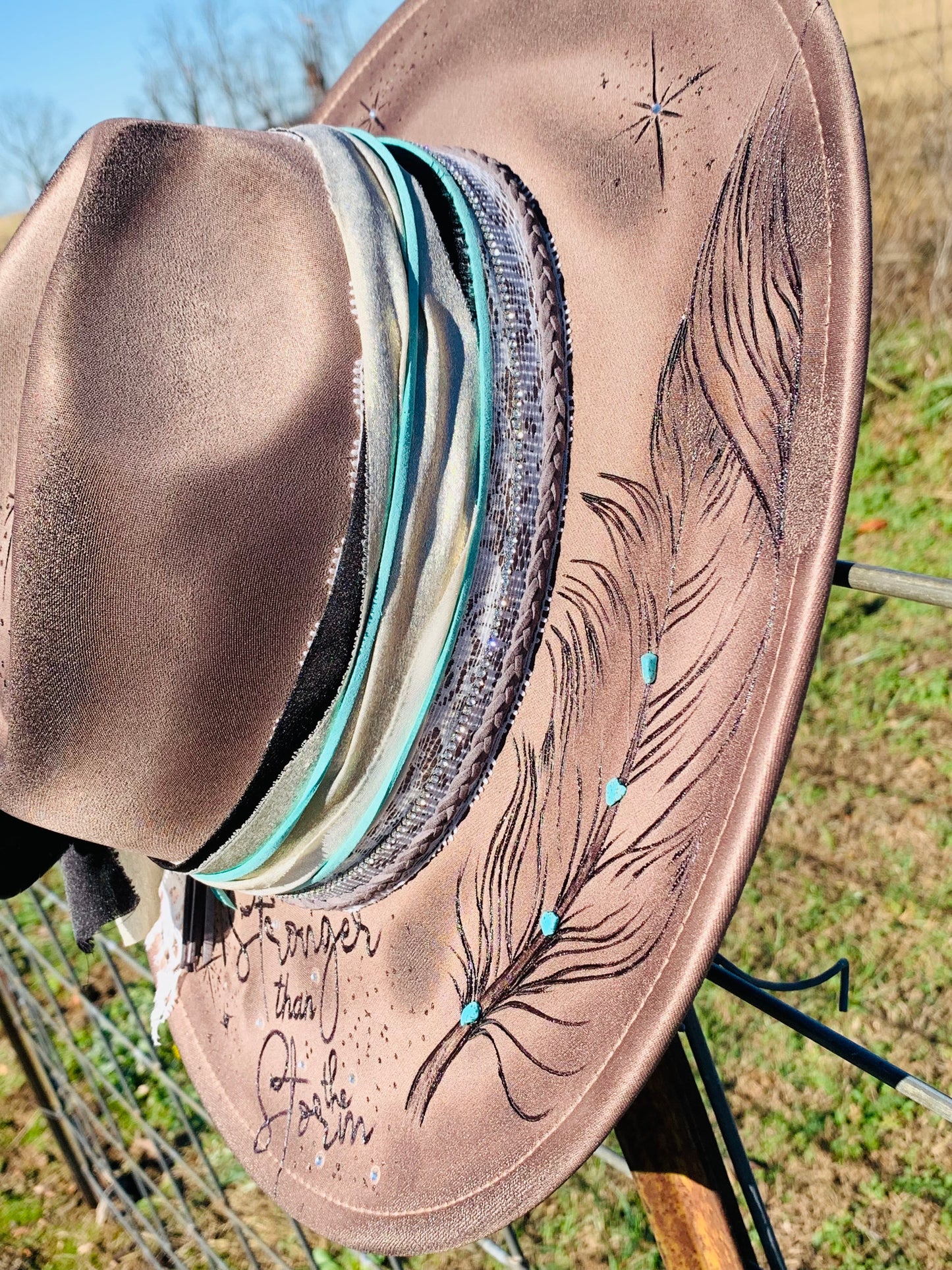 Hand Burned Rancher Hat with Feathers "Stronger than the Storm"