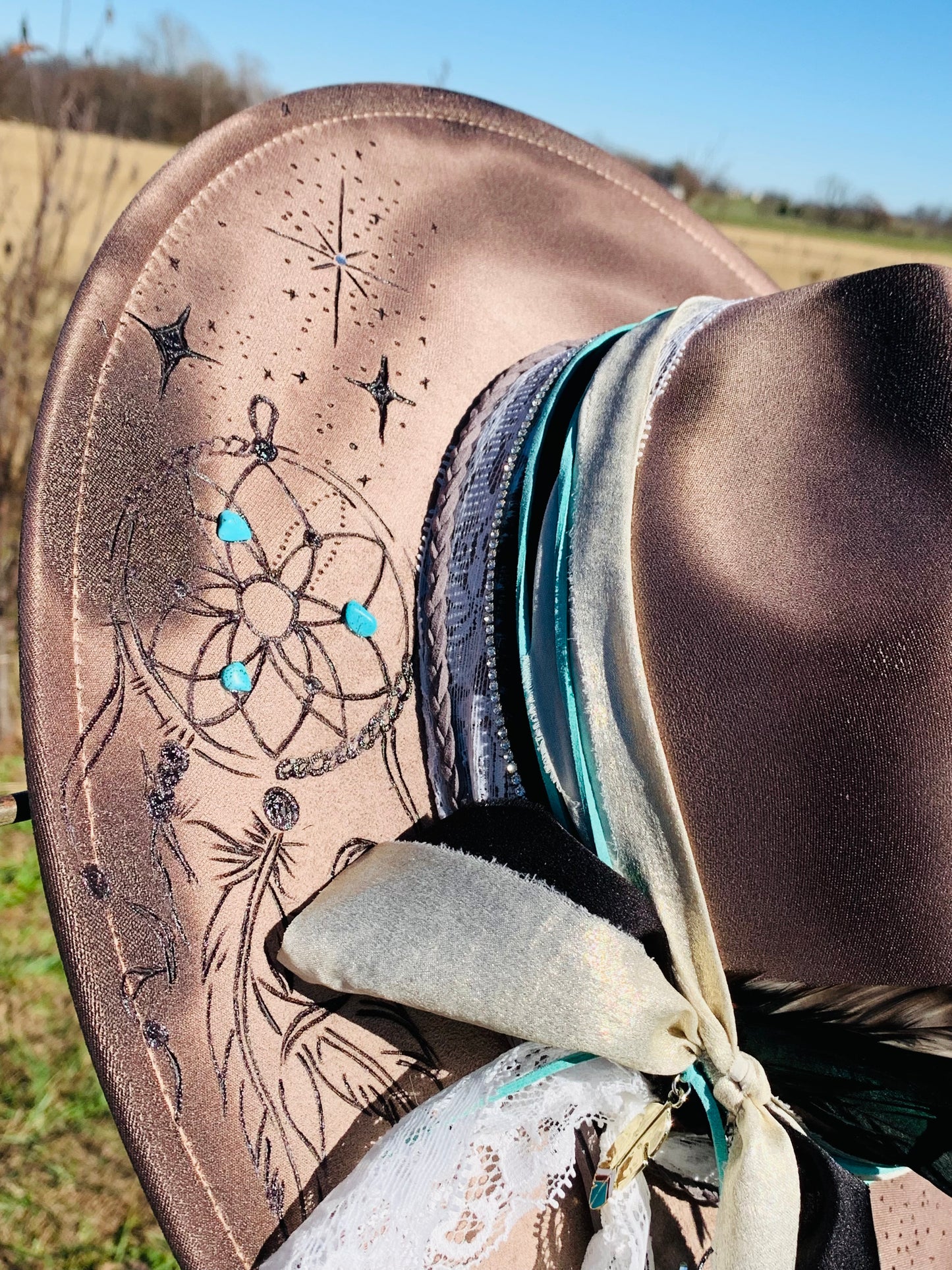 Hand Burned Rancher Hat with Feathers "Stronger than the Storm"